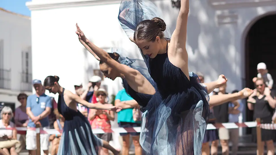 Girls dance on the street in Nerja