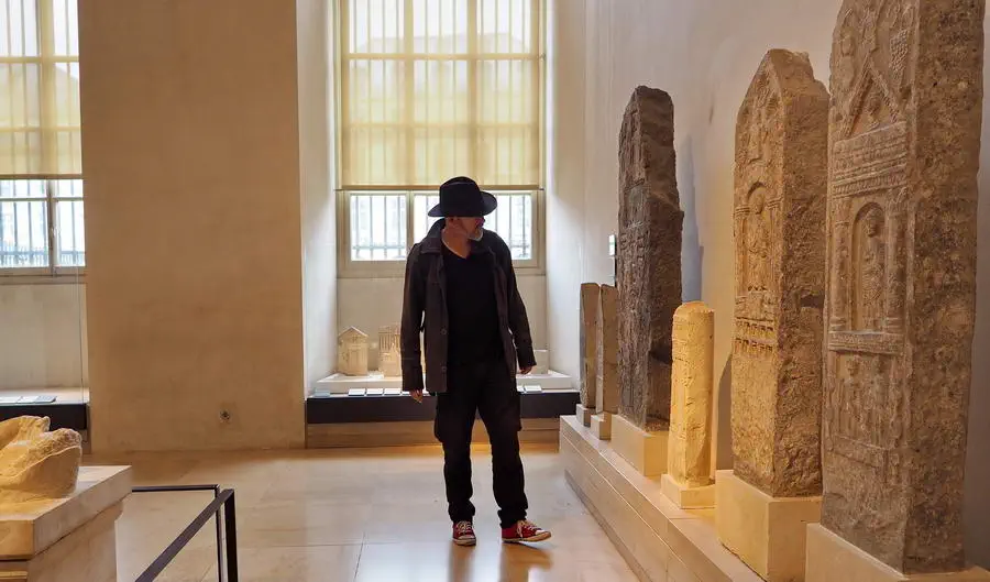 Louvre Museum in Paris. Peter Smith in the museum.
