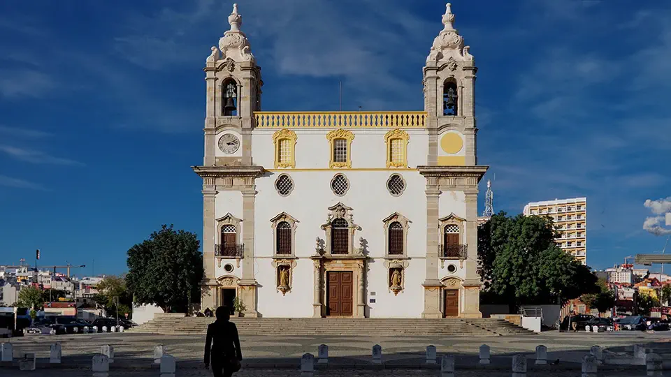 The baroque church of Igreja Nossa Senhora da Carmo in Faro and gold from Brazil