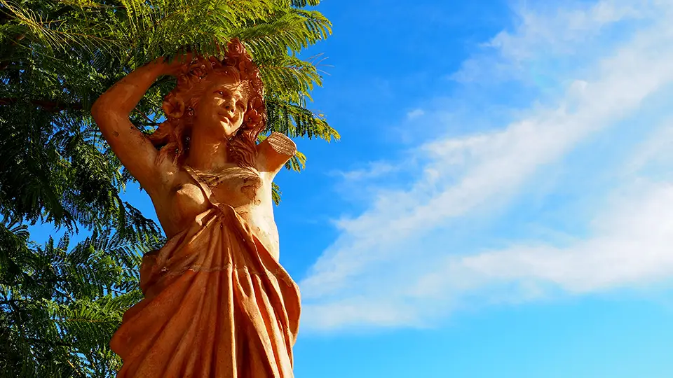 Palacio de Estoi near Faro. Sculpture of a woman.