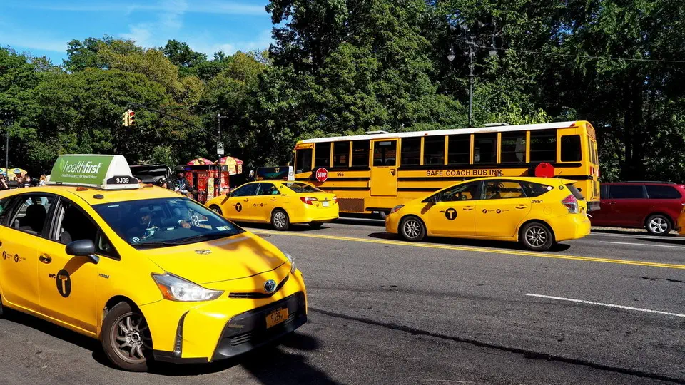 Central Park in New York and yellow taxis