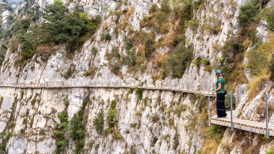 La Pasarela de Relleu a wooden walkway suspended above a deep gorge.