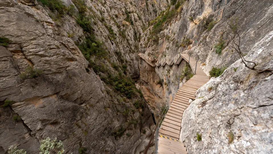 La Pasarela de Relleu a wooden walkway suspended above a deep gorge.